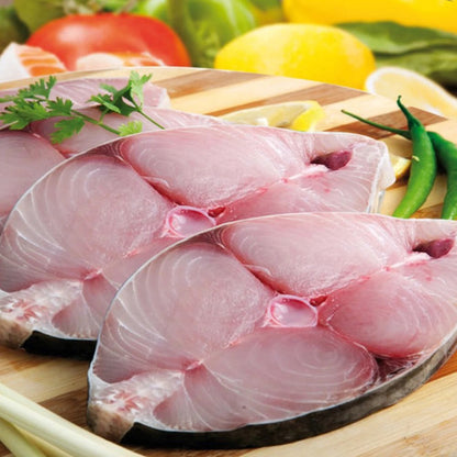 Fish Frozen Wild Caught Kingfish Steaks Clean and excellent taste. 
(French: Darnes de Thazard Surgelés)